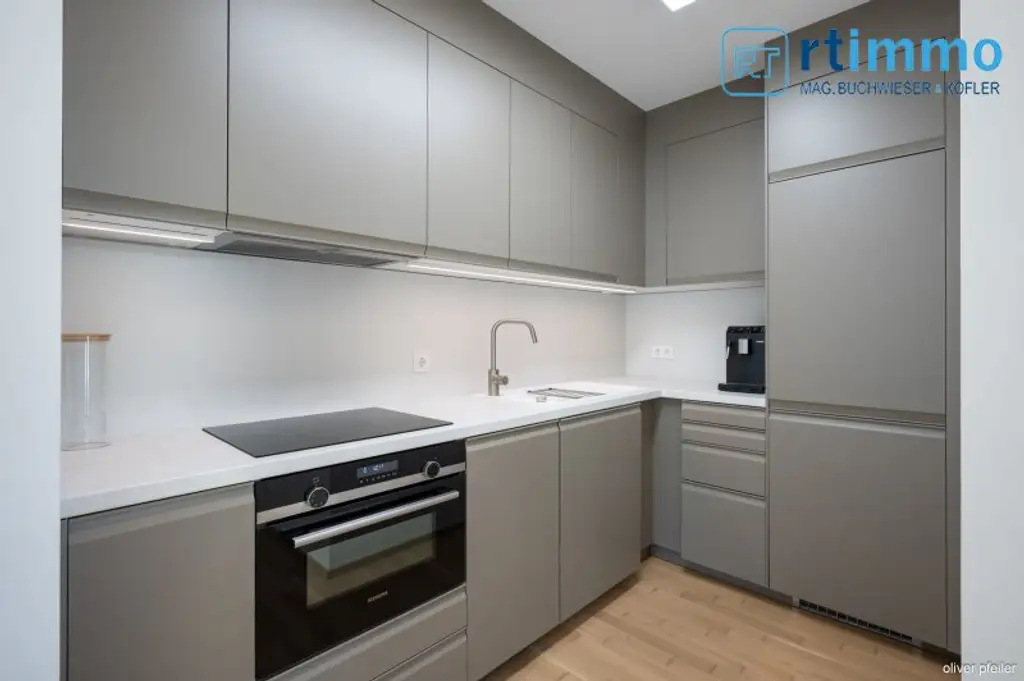 LEBENSGEFÜHL PUR - DACHGESCHOSSWOHNUNG MIT GROSSZÜGIGEN TERRASSEN IM GRÜNEN UND 2 GARAGENSTELLPLÄTZEN