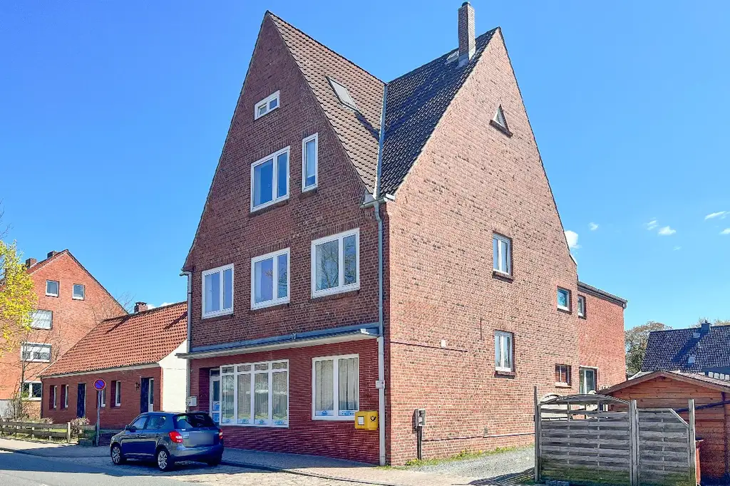 Zentrale Kapitalanlage - Mehrfamilienhaus mit Gewerbeeinheit sucht Käufer