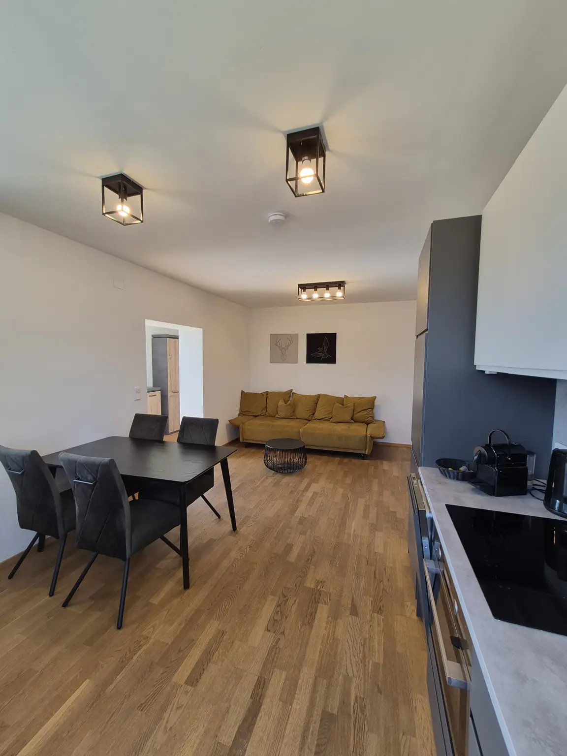 Ca. 64 m² Wohnung mit ca. 107 m² Eigengarten & Klimaanlage - Perfekt als Haupt- od. Zweitwohnsitz - Lebensqualität zwischen See und Reben