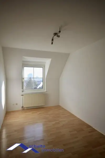 Attraktive 3-Zimmer-Dachgeschosswohnung im Zentrum von Guntramsdorf zu mieten! Überdachter Parkplatz inklusive!