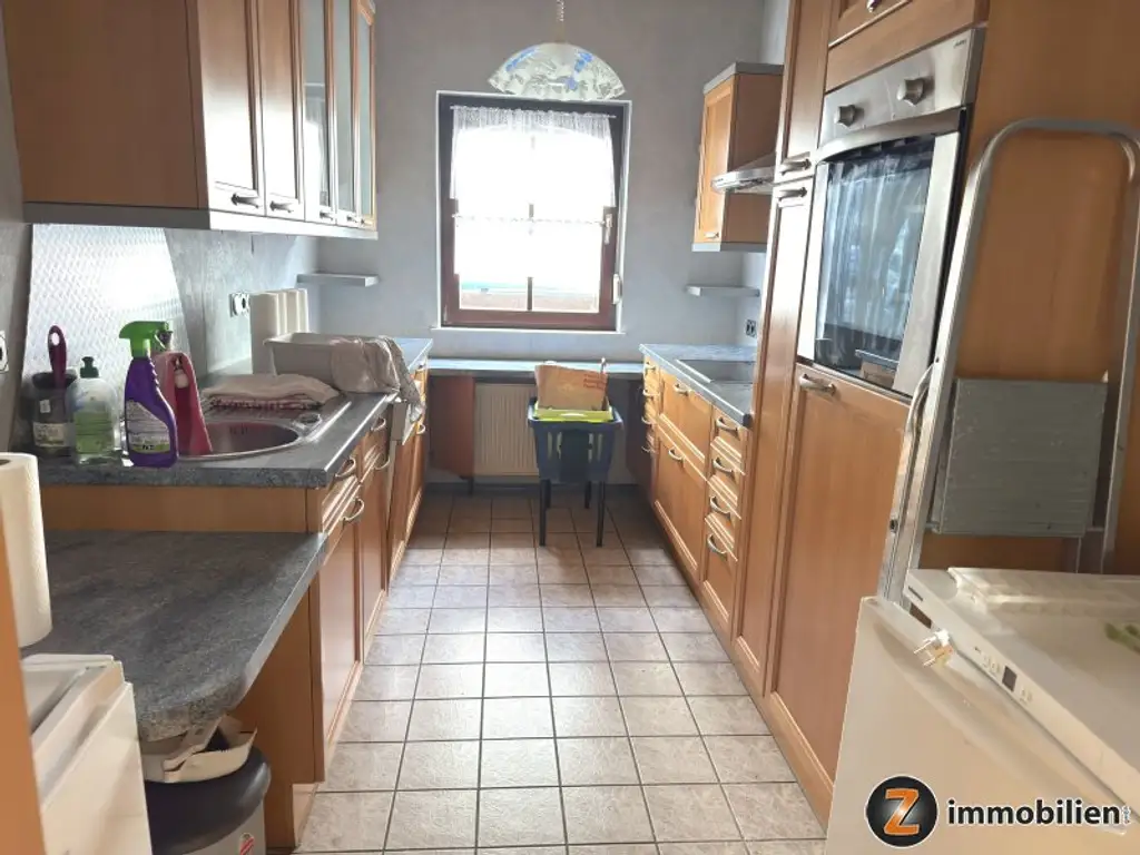 Einfamilienhaus mit Garage, schönem Garten und Teich in ruhiger Wohnlage