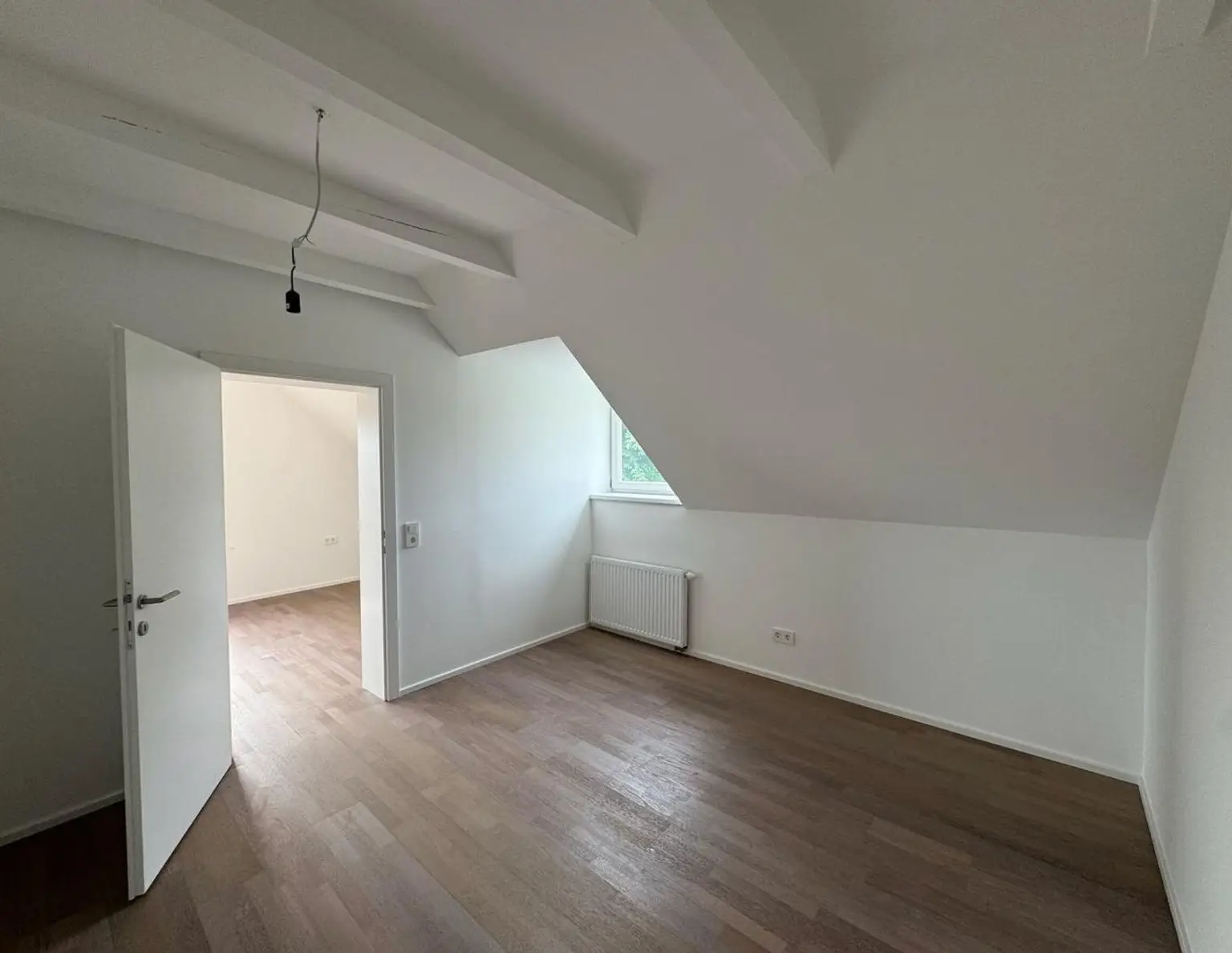 Top 2 - Gemütliche 2-Zimmer-Dachgeschosswohnung mit Blick auf den Grünberg und Traunstein