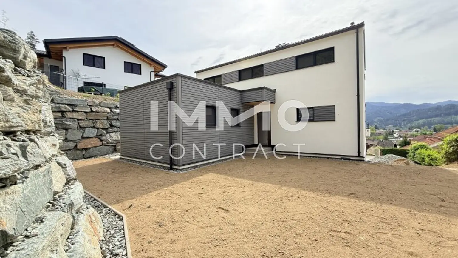 Modernes Griffner-Architektenhaus mit Burgblick