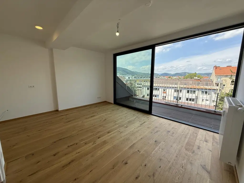 Erstbezug: Moderne Dachgeschosswohnung mit Balkon und Lift in begehrter Lage nahe dem Lendplatz K6/11