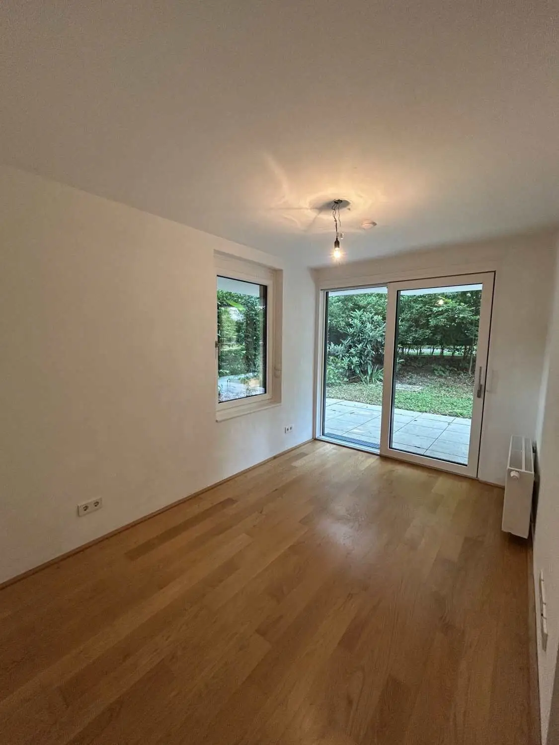 Moderne 4-Zimmer-Gartenwohnung mit Terrasse und Garagenplatz