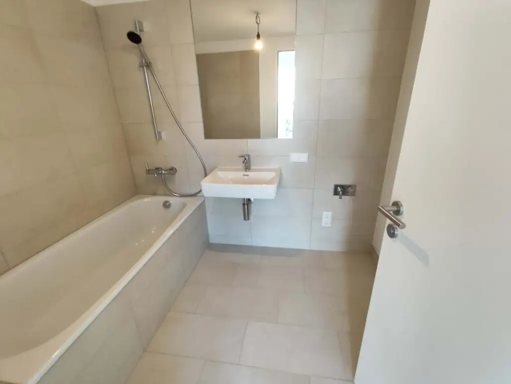 NEUBAU DACHGESCHOß-3-Zimmer-ERSTBEZUG mit Balkon in 1210 Wien! Top 2/50