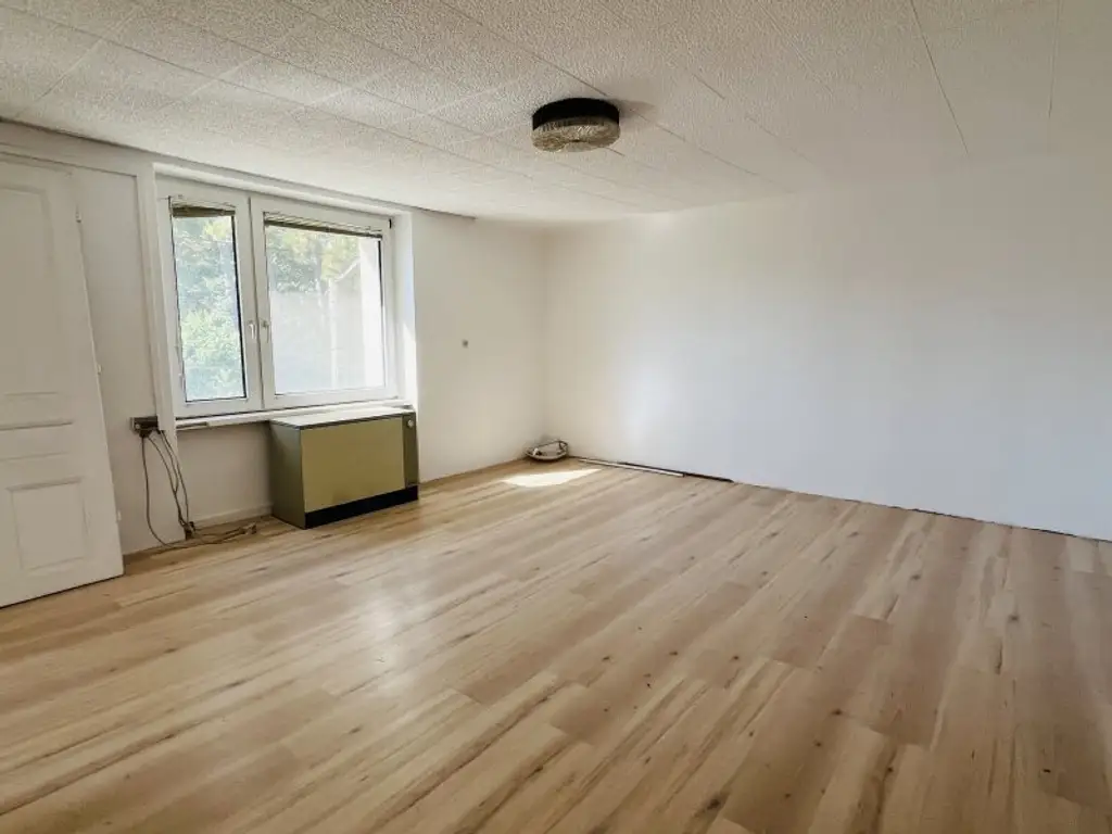 Sanierungsbedürftiges Einfamilienhaus in gefragter Esslinger Siedlungslage