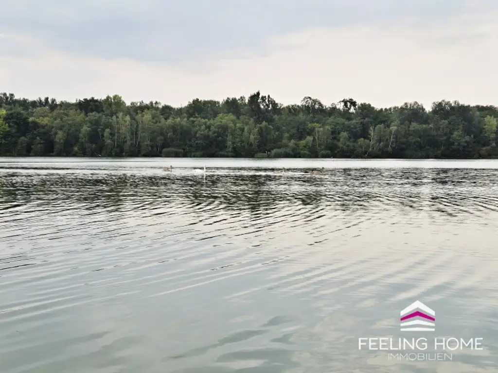 WASSERNÄHE TRIFFT POTENZIAL: Charmantes Sommerhaus mit 2 Grundstücken nur 5 Min. zur Donau – Ganzjähriges Wohnen erlaubt!