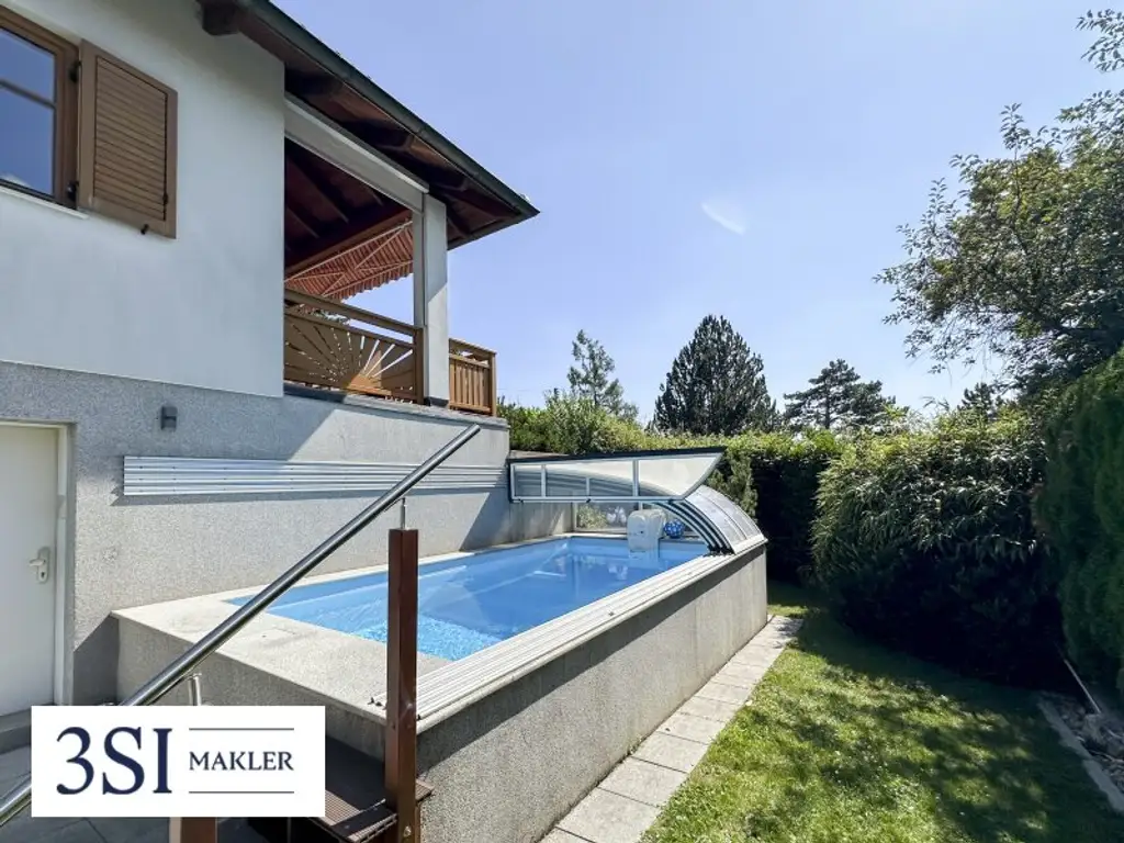 Traumhaftes Wohnen: Bungalow mit Pool & zusätzlichem Grundstück