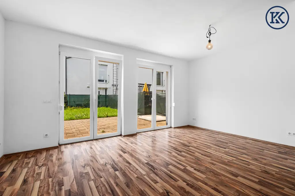 Zuhause im Grünen – Lichtdurchflutete Wohnung mit Dachterrasse & Gartenoase