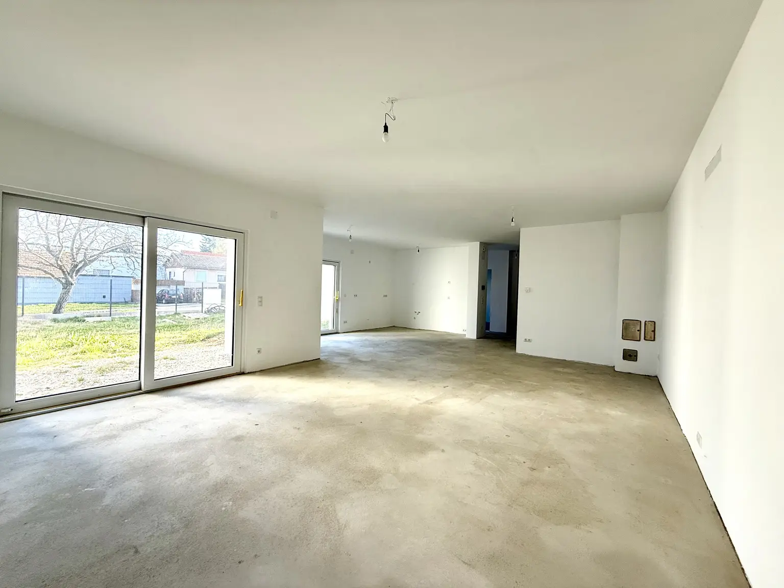 Wohnen mit Stil in Sigleß – Garage, Garten und Dachterrasse inklusive