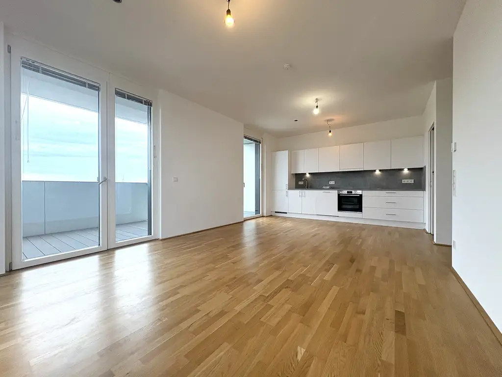 MARINA TOWER I Moderne 3 Zimmerwohnung mit Balkon und Loggia I Donaublick