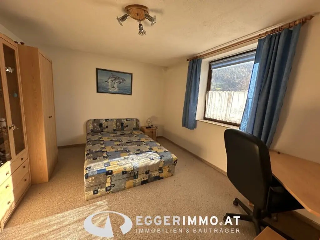 Niedernsill - Spacious 4-Room Apartment with Garden & Balcony for Sale in a Two-Party House