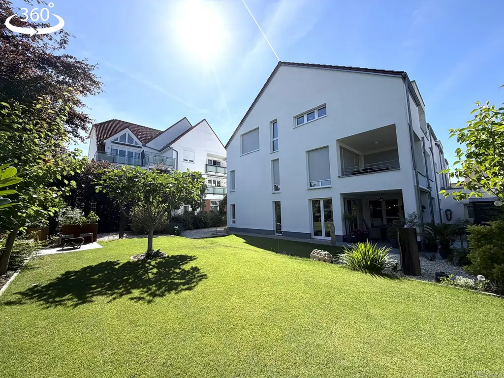 Exklusive, barrierefreie Erdgeschosswohnung in hochwertiger Ausstattung mit Privatgarten und Garage