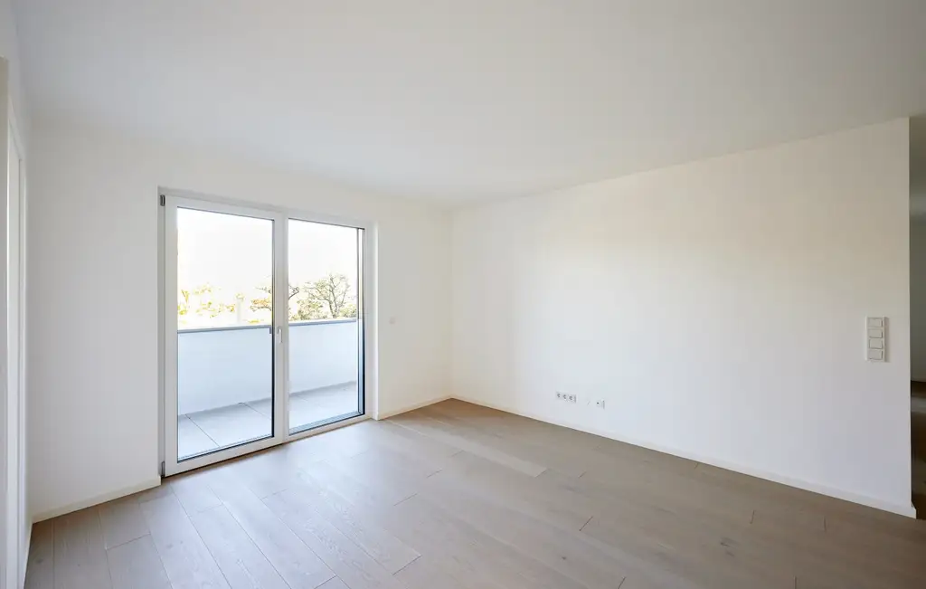 ERSTBEZUG!  4-Zimmer-Wohnung mit Balkon und Parkblick nahe der Donau!