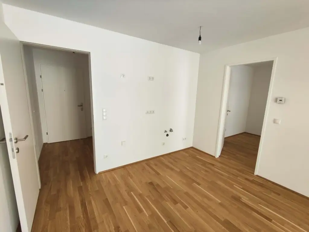 TOP NEUBAU 2-Zimmer-ERSTBEZUG mit Balkon im 4. OG in 1210 Wien! Top 1/30