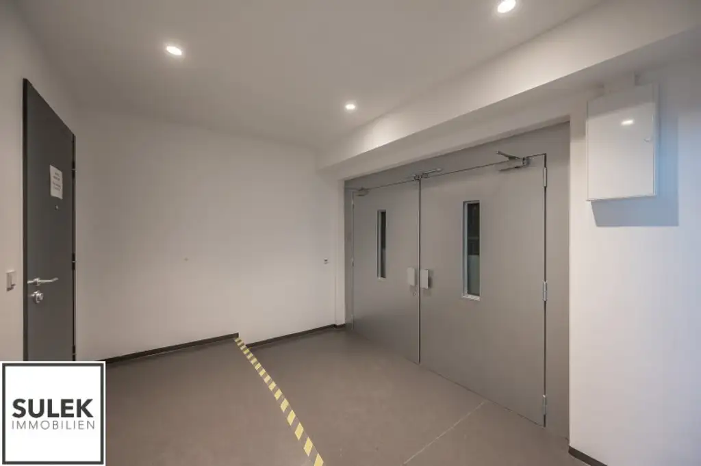 Grundstück mit vier Baukörpern - Büro-, Geschäfts- und Gewerbegebäude inkl. Parkplätzen in Vösendorf