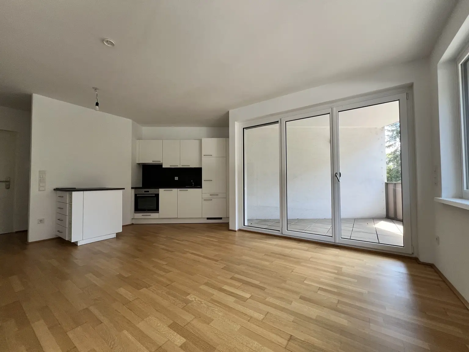 Wohnzimmer mit Küche