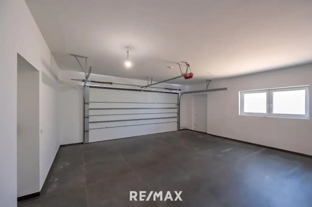 Erstbezug: Großzügiger Familientraum mit unverbaubarem Grünblick!