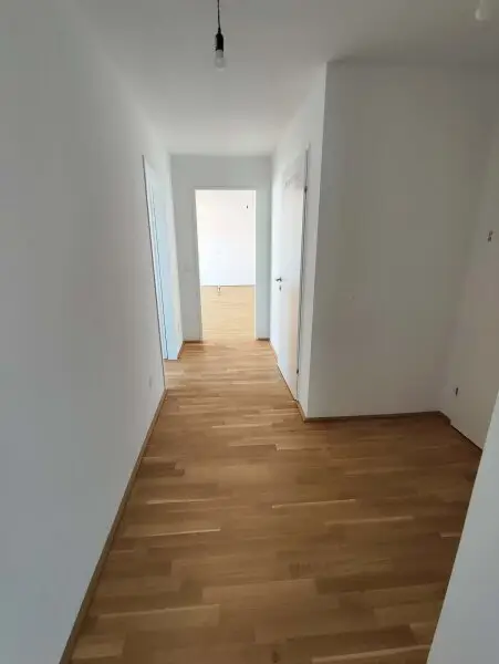 NEUBAU DACHGESCHOß-3-Zimmer-ERSTBEZUG mit Balkon in 1210 Wien! Top 2/43