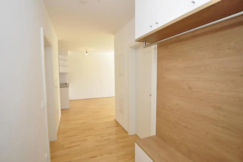 Moderne, sonnige Erdgeschoßwohnung mit Eigengarten und Tiefgarage