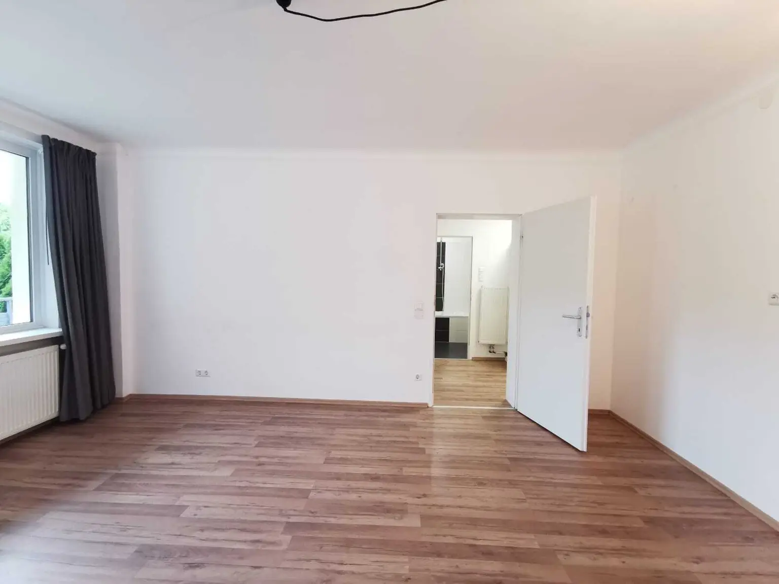 Sonnige 3 Zimmer Wohnung mit Gartenbenützung