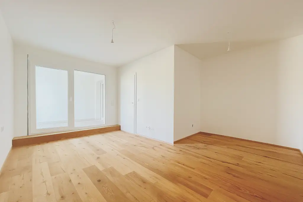 Wohnen, wo die Stadt ausatmet – 2 Zimmer mit Loggia ins Grüne