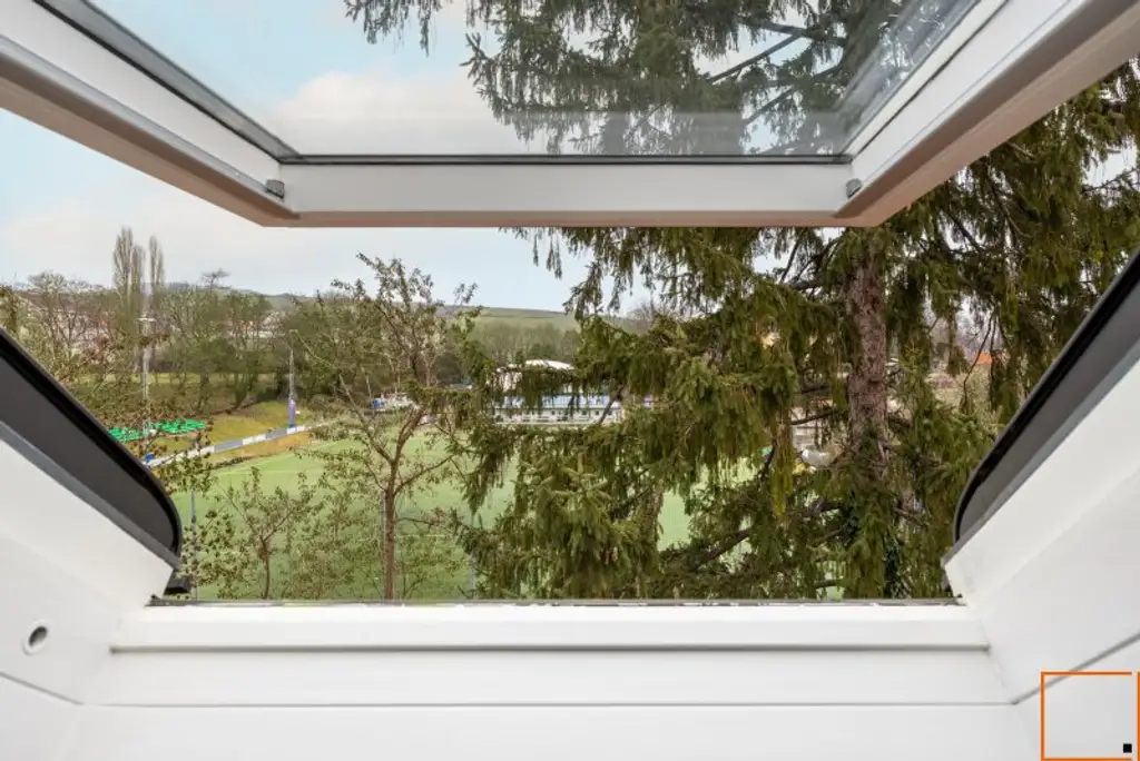 Luftiges Familien-Penthouse mit Ateliercharakter, großen Terrassen und Grünblick