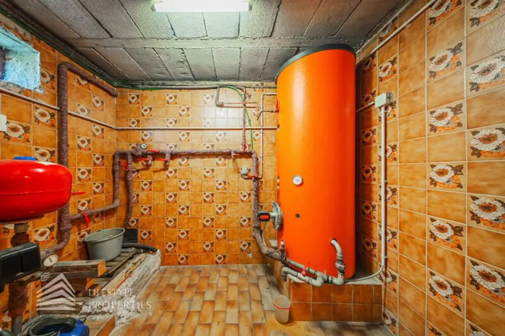 Großzügiges Familienrefugium in absoluter Ruhelage – charmantes Wohnhaus auf 1.000 m² Traumgrundstück in 1220 Wien