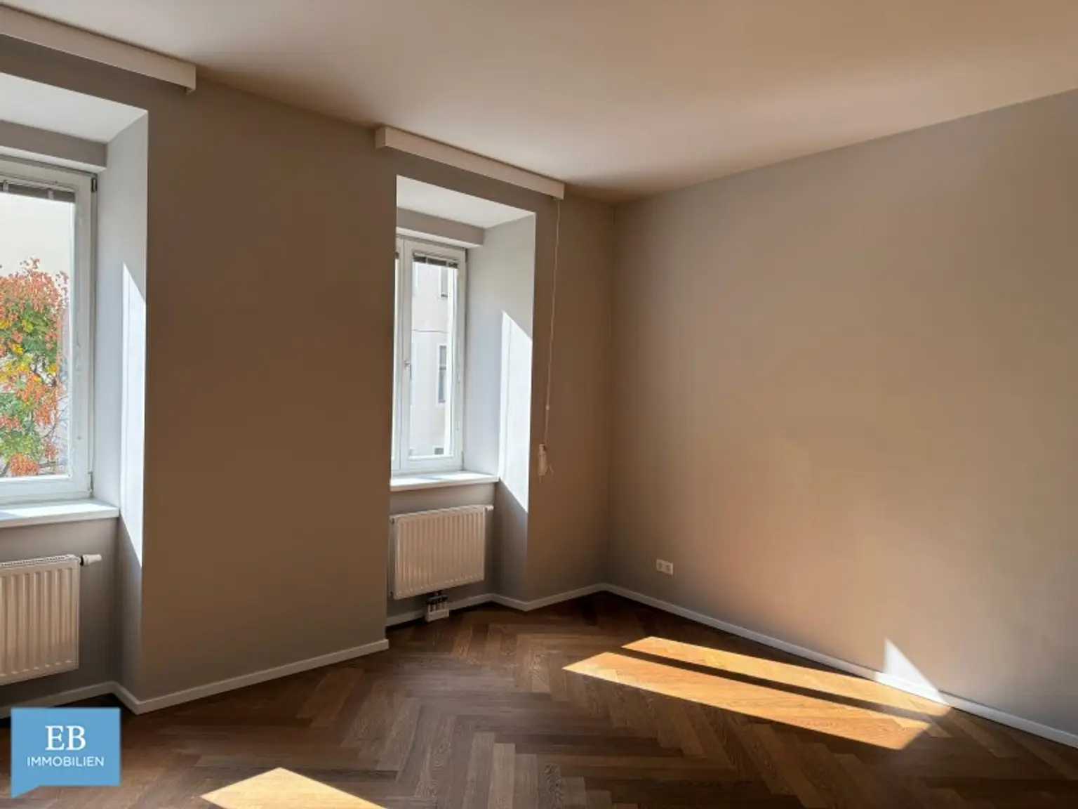Helle Familienwohnung mit feiner Farbwelt und Fitnessraum im Haus