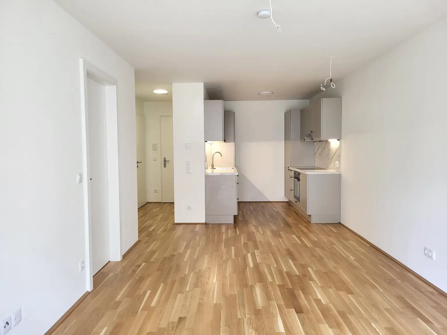 Wohnzimmer mit Küche