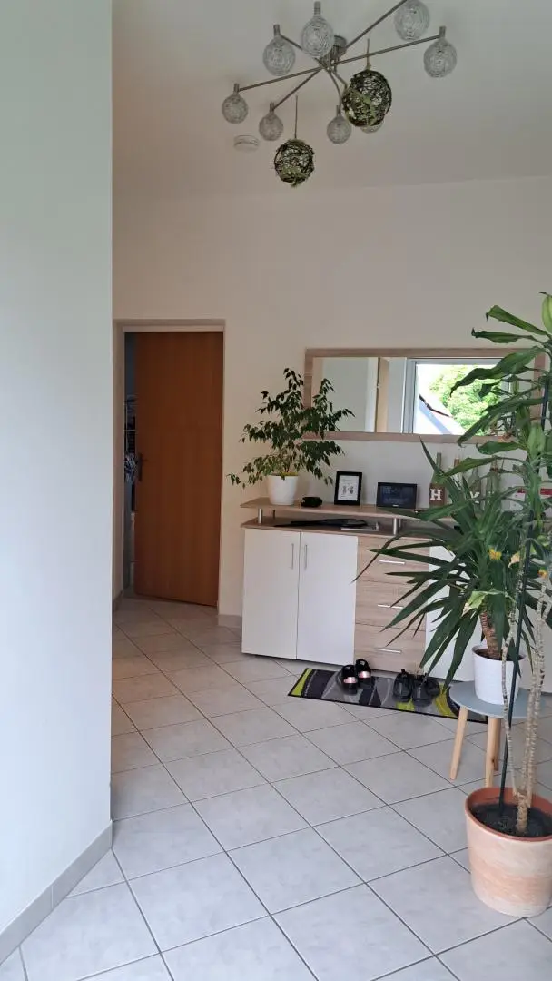 Charmante große Mietwohnung mit Kachelofen und eigenem Garten.