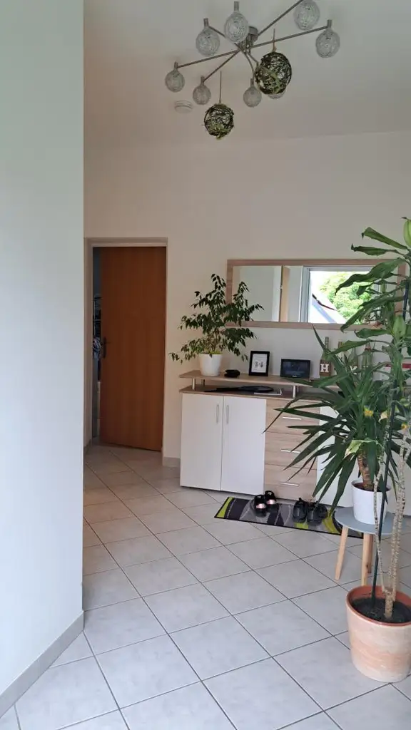 Charmante große Mietwohnung mit Kachelofen und eigenem Garten.