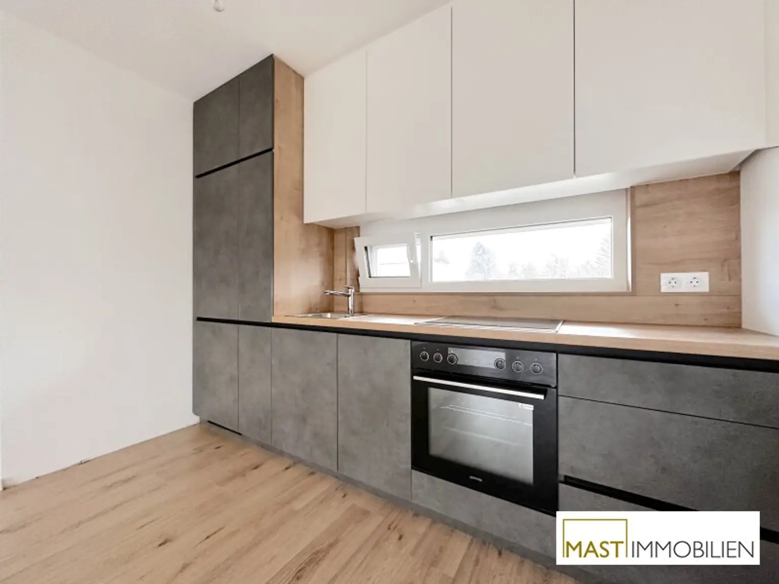 Ab sofort! Lichtdurchflutete 2-Zimmer-Neubauwohnung mit 8m² Terrasse