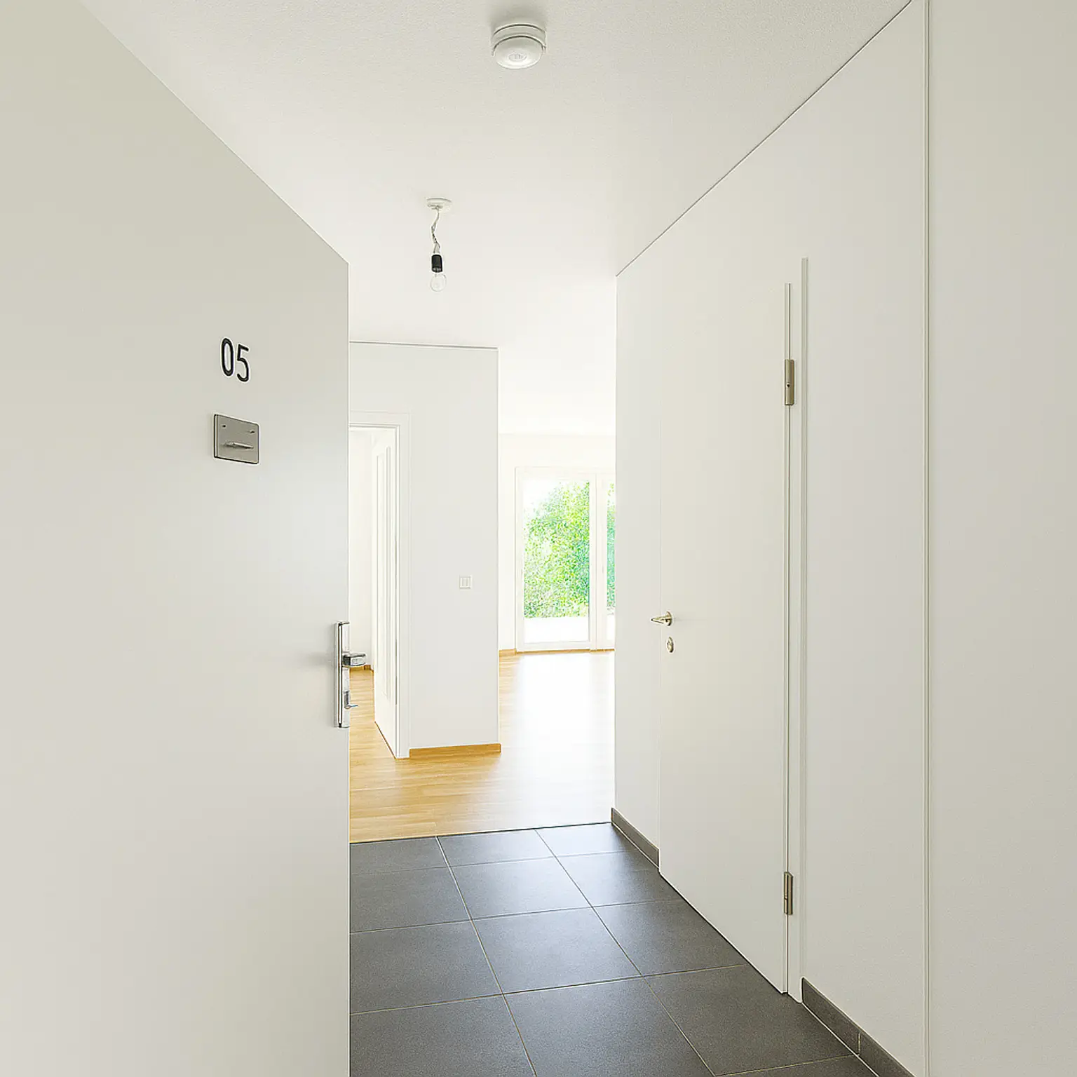 Neubau-Erdgeschoss mit Traumgarten – ideal für Singles & Paare!