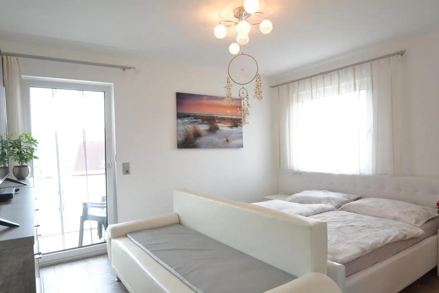 Schlafzimmer mit Balkon