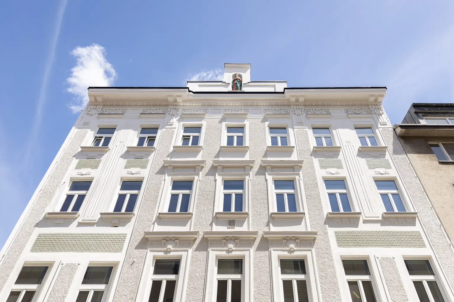 Innenarchitektonisch gestaltete 2-Zimmer-Musterwohnung mit Wohnküche und Terrasse