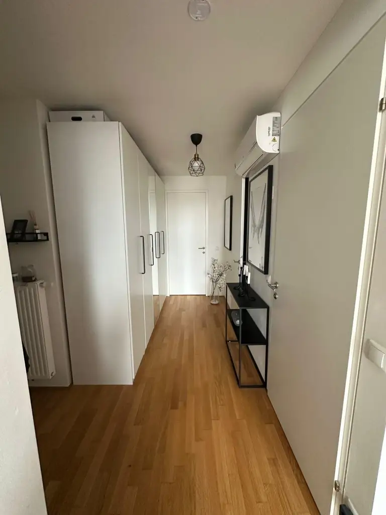 Klimatisierte Neubauwohnung mit hofseitigem Balkon im Dachgeschoss!!!
