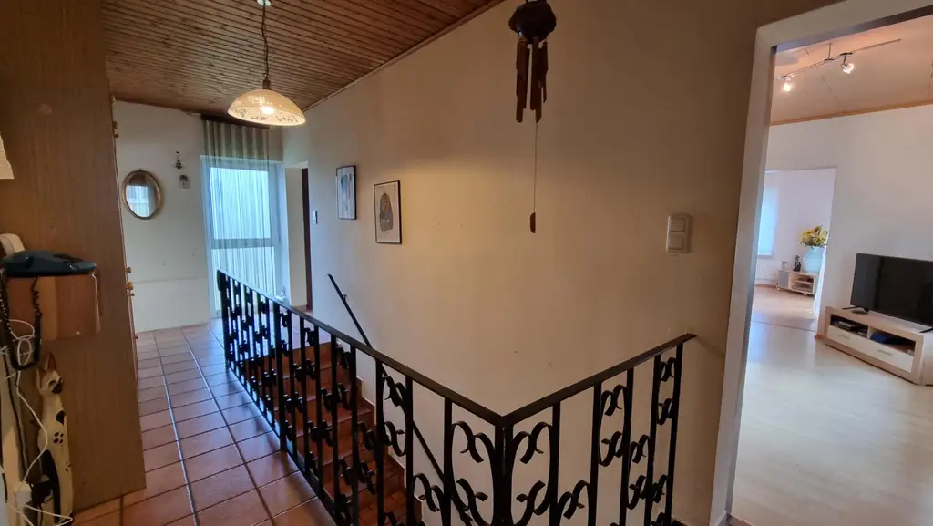 Vielseitiges Mehrfamilienhaus mit Charme und einladendem Garten