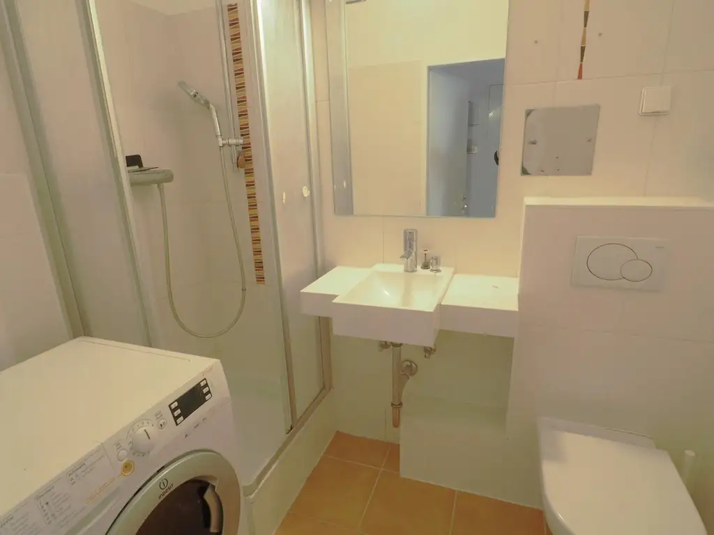 AUSGEZEICHNETE INFRASTRUKTUR - SCHÖNE VERMIETETE 3-ZIMMER-WOHNUNG MIT IDYLLISCHEM GEMEINSCHAFTSGARTEN