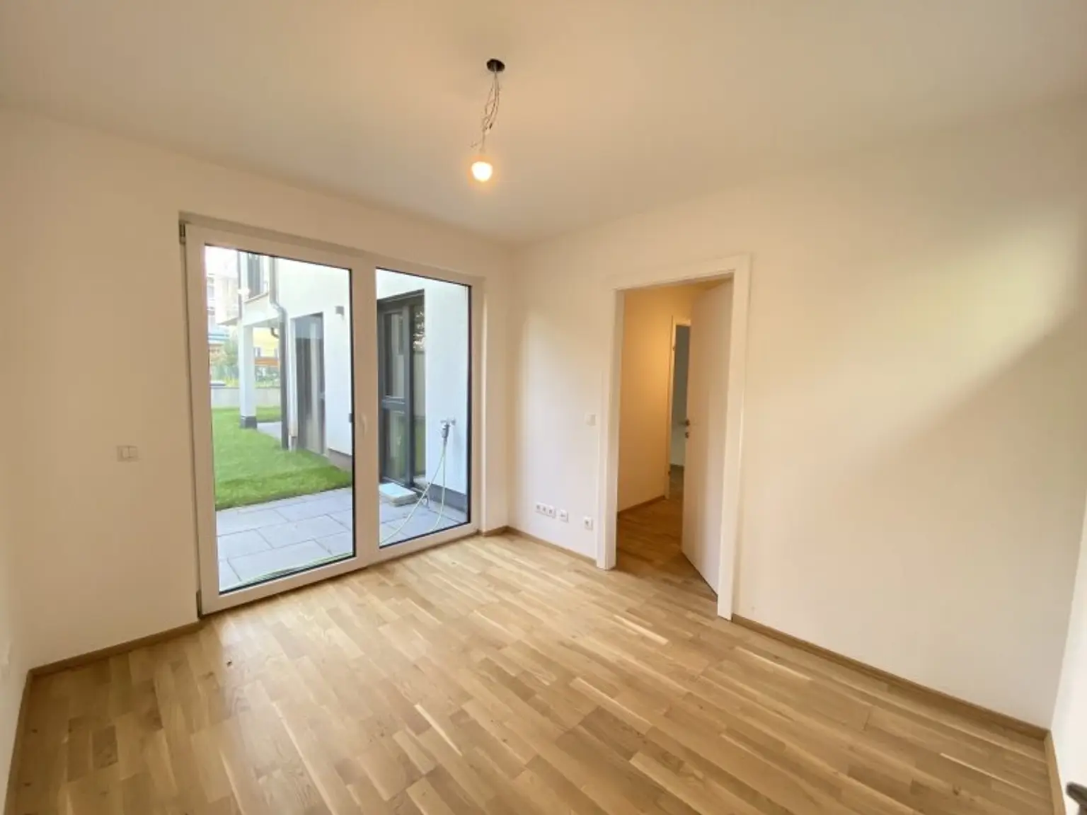 Neuwertige Gartenwohnung an der Langobardenstraße - Hofruhelage - Luftwärmepumpe