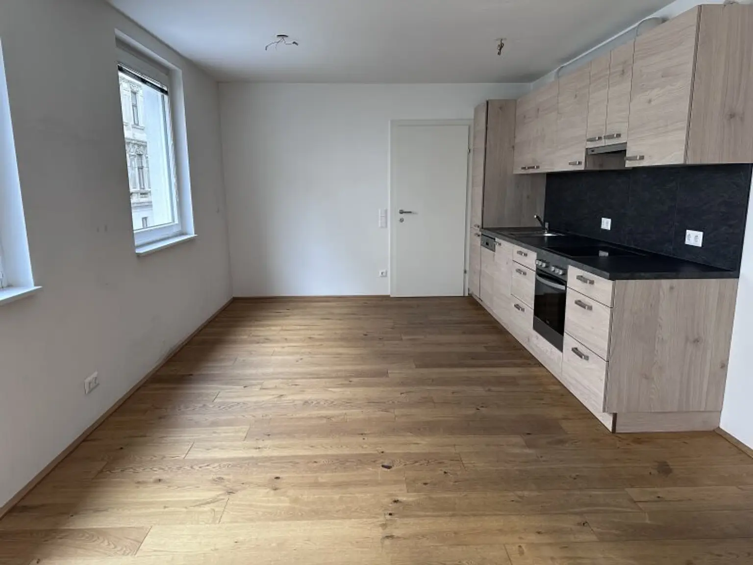 Anlegerwohnung in TOP-Neubau (BJ 2017) mit Tiefgaragenoption – BESTANDSFREI