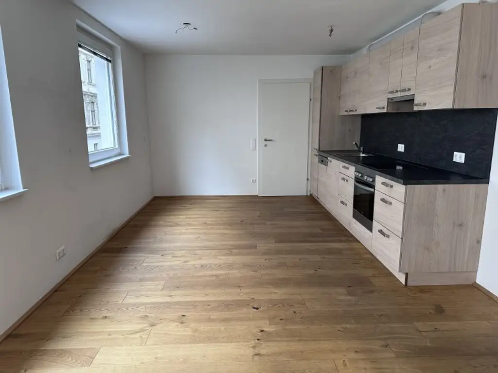 Anlegerwohnung in TOP-Neubau (BJ 2017) mit Tiefgaragenoption – BESTANDSFREI