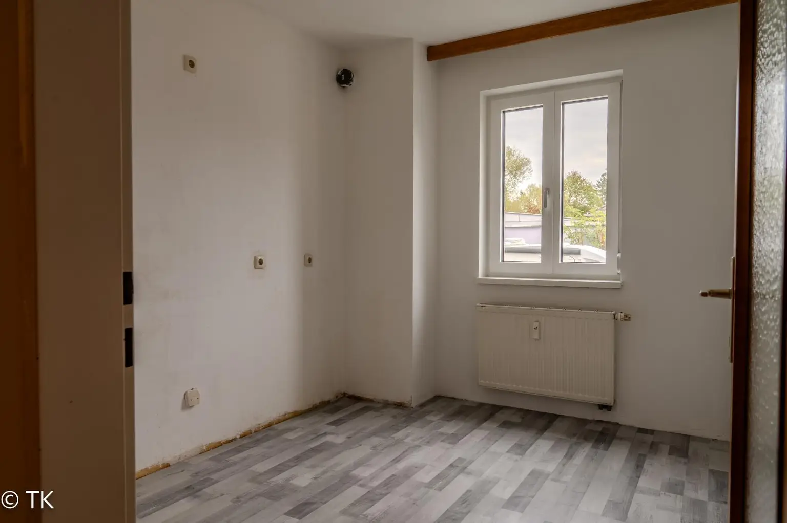 Freundliche Erdgeschosswohnung mit Tiefgaragenplatz und Loggia