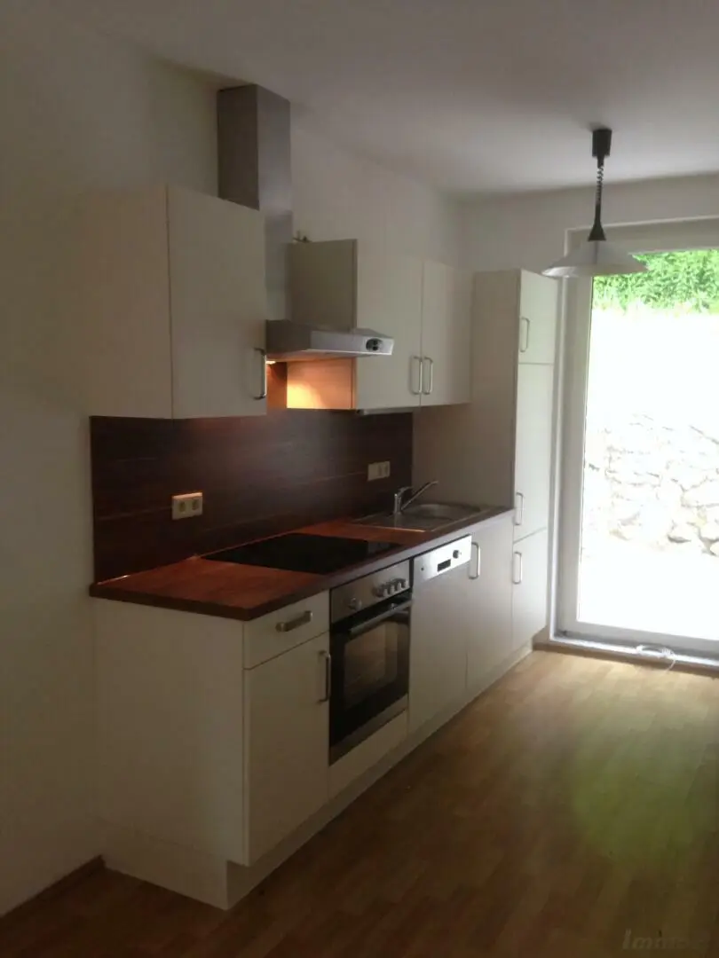 Küche mit Ausgang auf die Terrasse