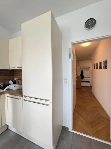 Eleganz am Schwedenplatz – Maßgeschneiderter Wohntraum mit Blick auf die Stadt