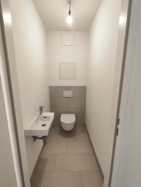 TOP NEUBAU 2-Zimmer-ERSTBEZUG mit Balkon im 1. OG in 1210 Wien! Top 1/5