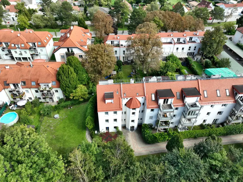 Einziehen und wohlfühlen! Moderne 2-Zimmerwohnung in Grün- und Ruhelage mit Terrasse und Eigengarten – Carport inklusive!