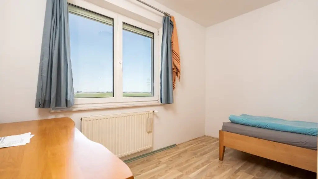 Kapitalanlage mit Potential – 2 Häuser auf Eckgrundstück mit rund 938 m² Grundstücksfläche!