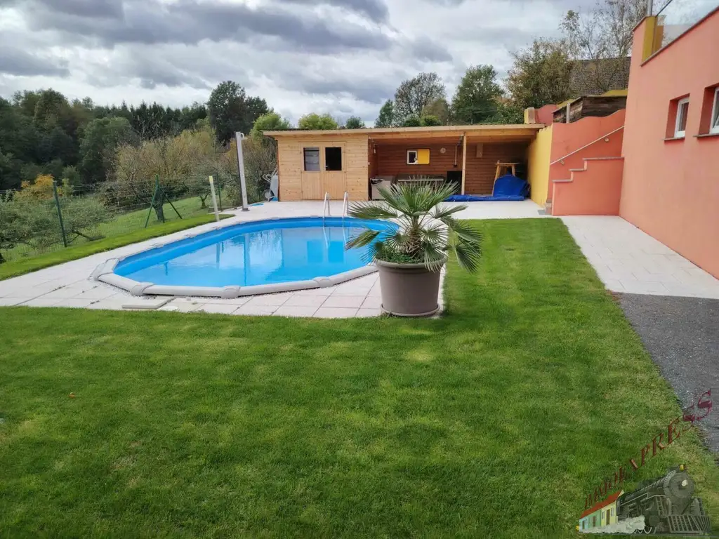 Tolles Einfamilienhaus mit Pool, Panorama-Ausblick und moderner PV-Anlage – hier fühlt sich Ihre Familie zuhause!